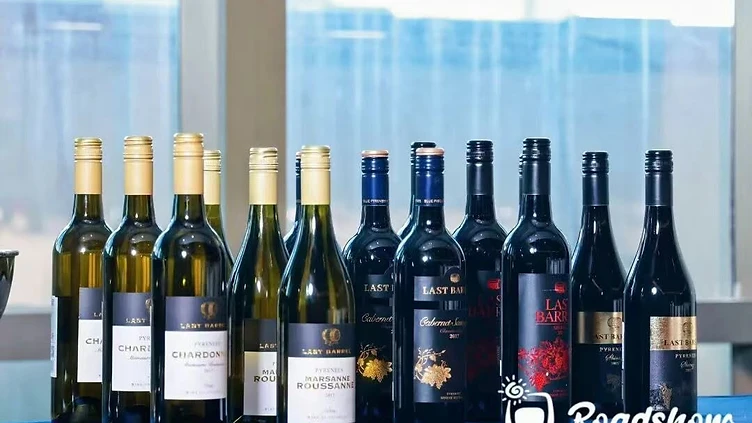 Austrian wine bottles and tasting glasses displayed for Chinese wine importers and distributors at a trade event