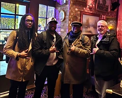 Brothers gathered at a London pub