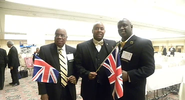 Brothers holding Union Jack flags at a General Convention