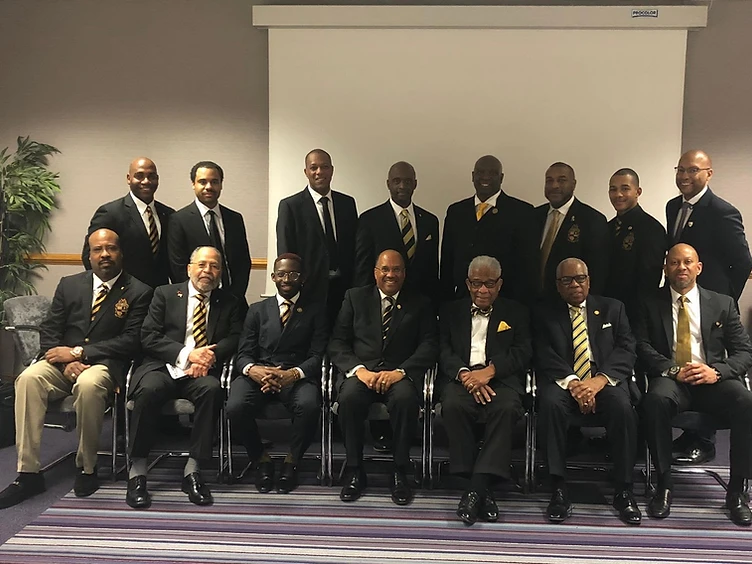 Brothers of Rho Chi Lambda in formal attire at a General Convention