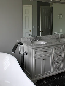 Primary bathroom remodel with freestanding tub and double vanity
