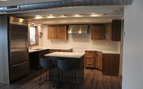 Kitchen remodel with custom cabinetry, island and pendant lighting