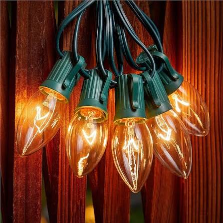 Close-up of professional C9 holiday light bulbs on a roofline