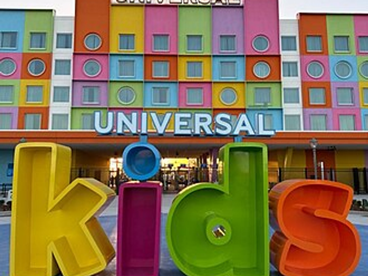 Universal Kids Resort entrance with colorful block letters spelling kids