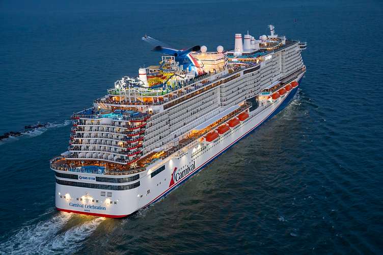 The Carnival Celebration cruise ship sailing through deep blue ocean waters