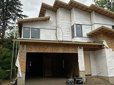 New build — house wrap stage, ready for siding installation