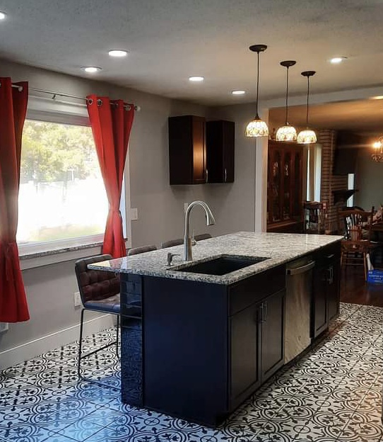 MB Contracting signature kitchen with patterned tile flooring