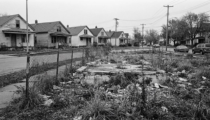 A vacant lot in a Detroit neighborhood before transformation