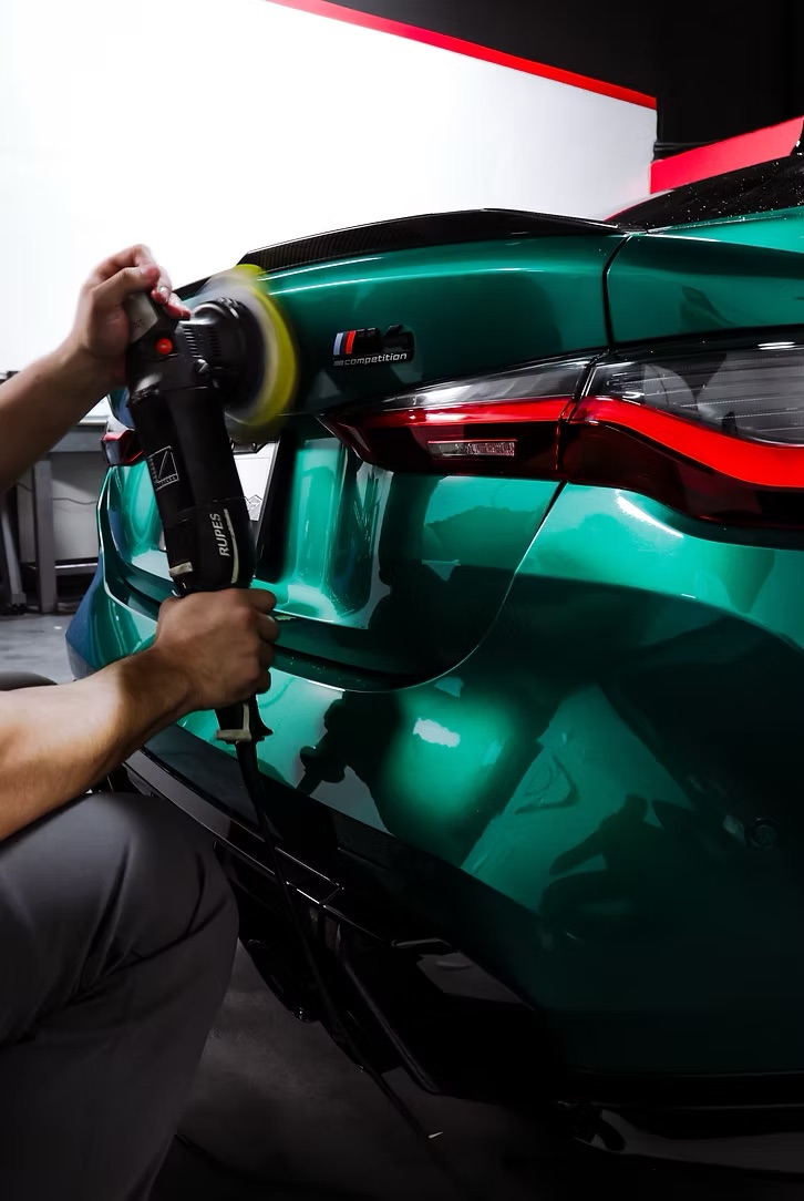 Polishing a BMW M4 before ceramic coating