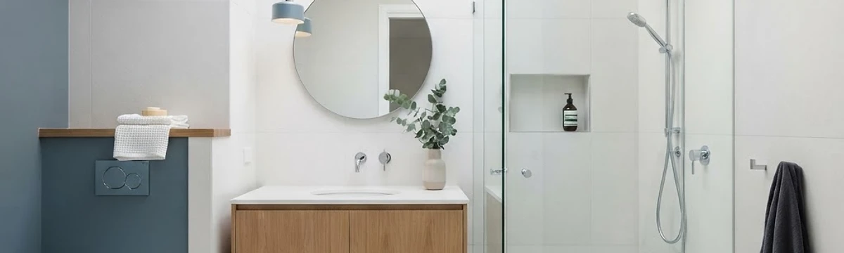Meridian Plumbing modern minimalist bathroom with chrome fixtures