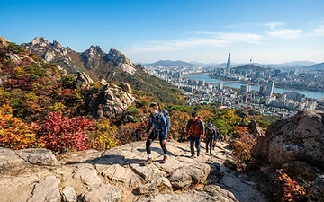 Guided hikers ascending Bukhansan's ridge trail