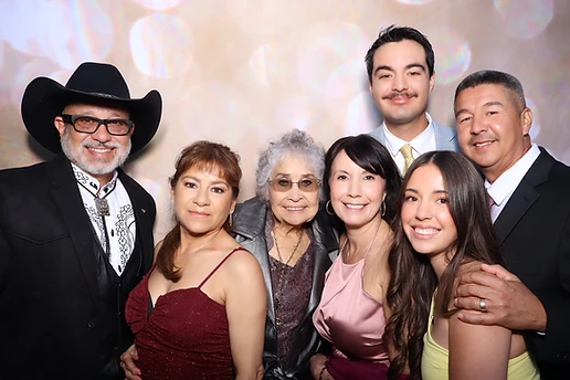 Guests holding printed photos from the Printing Booth