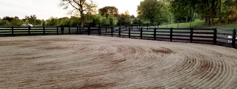 Riding arena at golden hour built by Backyard and Barns in Tennessee