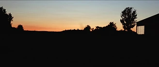 Sunset over the farm at the end of the evening