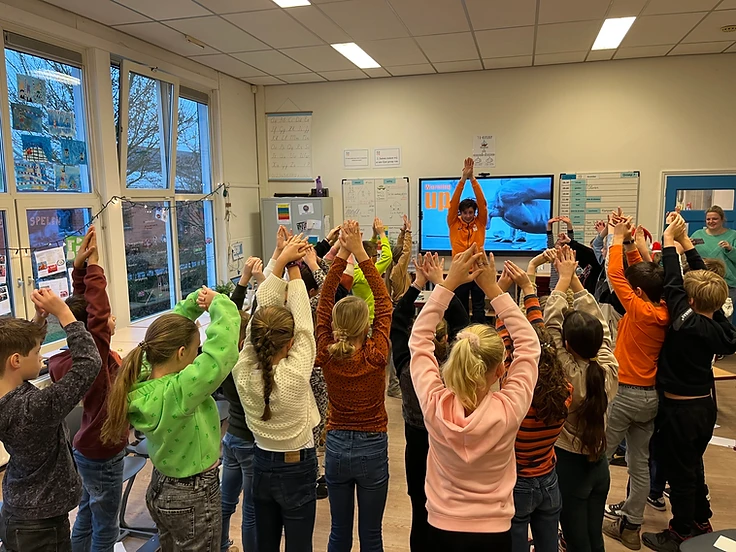 Olivier geeft een clinic op school
