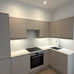 Handleless taupe kitchen, painted in West London