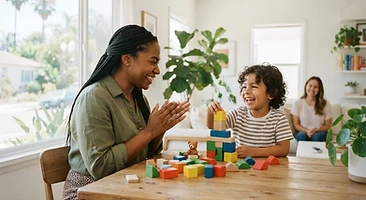A therapist and child sharing a joyful learning activity