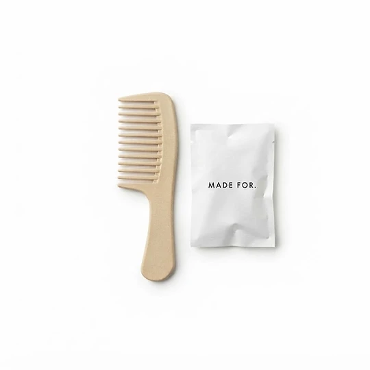 Comb with custom logo — hospitality