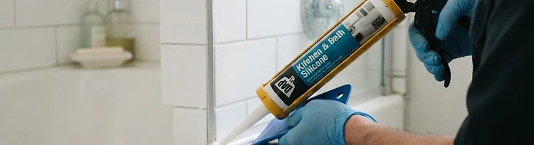 Tub edge re-caulked