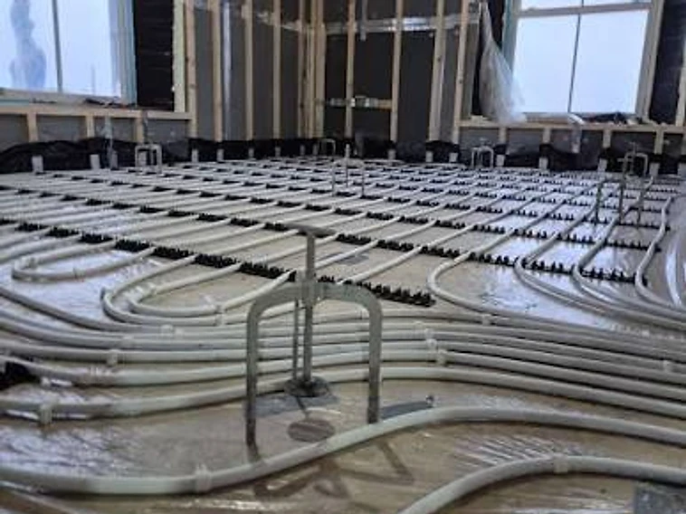 Underfloor heating pipework in place ready for a liquid screed pour — MPC Plastering
