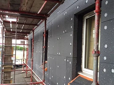 EWI insulation boards with mechanical fixings during installation, Mayo