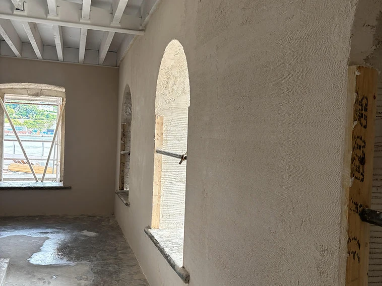 Interior lime render across arched window openings — MPC Plastering