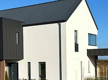 Finished EWI project — cream render with charcoal cladding, Mayo