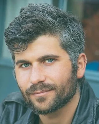 Portrait of Ben Umansky.