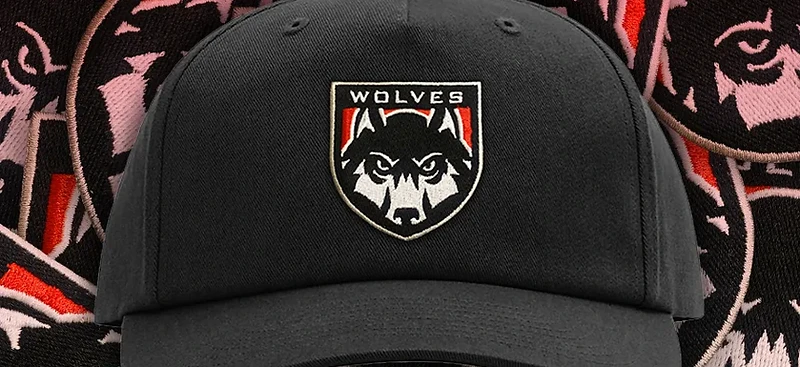 Embroidered Western Oregon Wolves patches and cap
