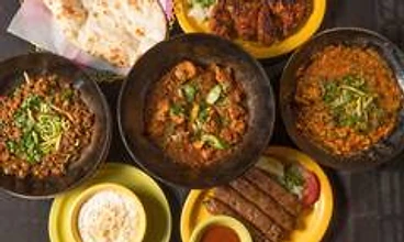 A generous spread of Uyghur dishes