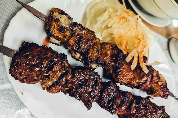 Grilled lamb rib kebabs on skewers