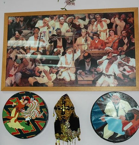 Traditional artwork and textiles at Kashkar Cafe