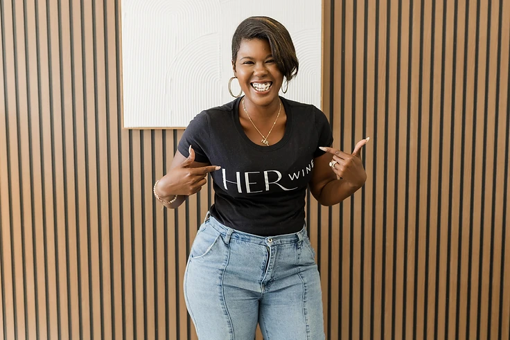 Dr. Nicole Anderson laughing in a HER WINE t-shirt