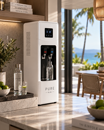 Portable PURE water dispenser unit on a stone counter in a tropical home
