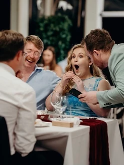 Sydney wedding magician performing close-up magic at a wedding reception
