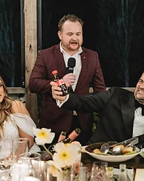 Guests react to close-up magic at a Sydney event, photo 11