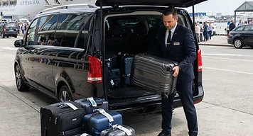 Cruise luggage being loaded into an executive transfer vehicle