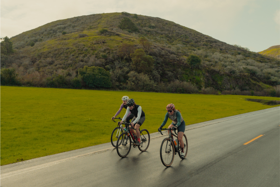 Cyclists riding on a coastal road