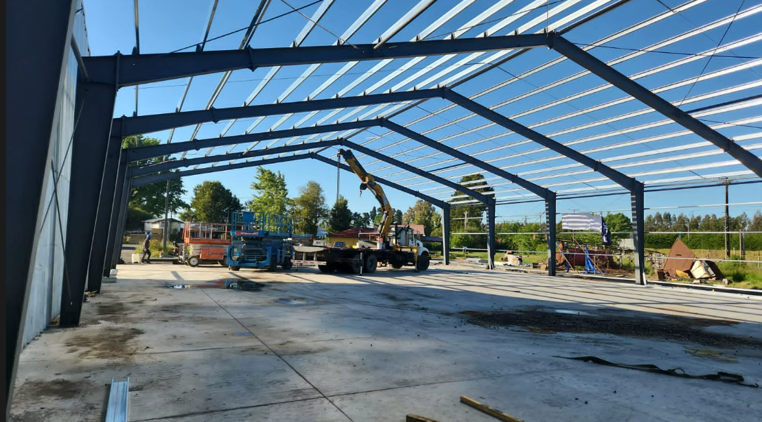 Warehouse interior framing with crane and lifts