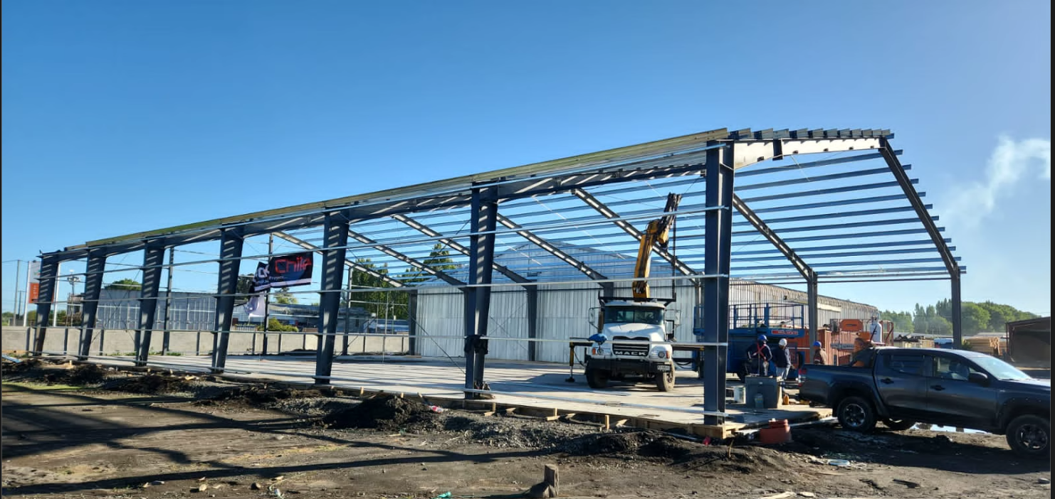 Steel frame erection with crane truck on site