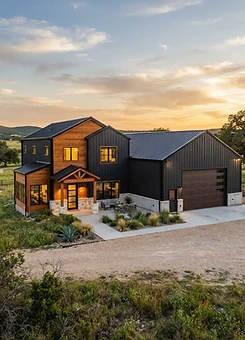 Steel frame barndominium home with garage