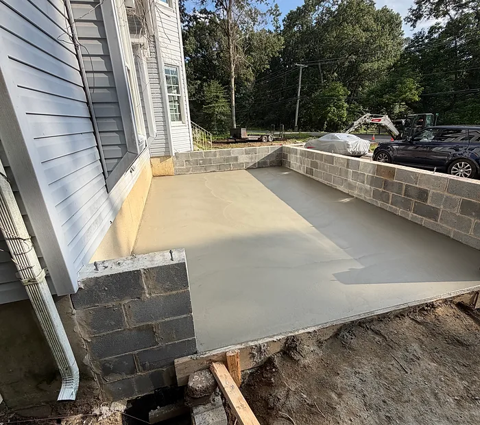 Patio pad & block wall