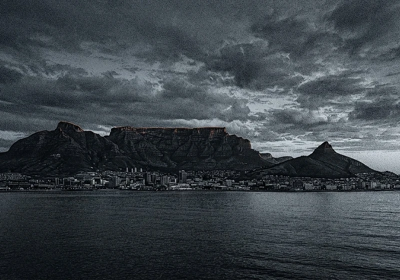 Table Mountain and Cape Town skyline at blue hour, etched in monochrome