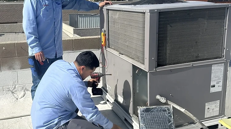 All Valley Air HVAC technicians in navy uniforms