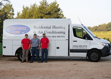 Heavenly Aire team members posing in front of a company service truck in Seneca, SC.