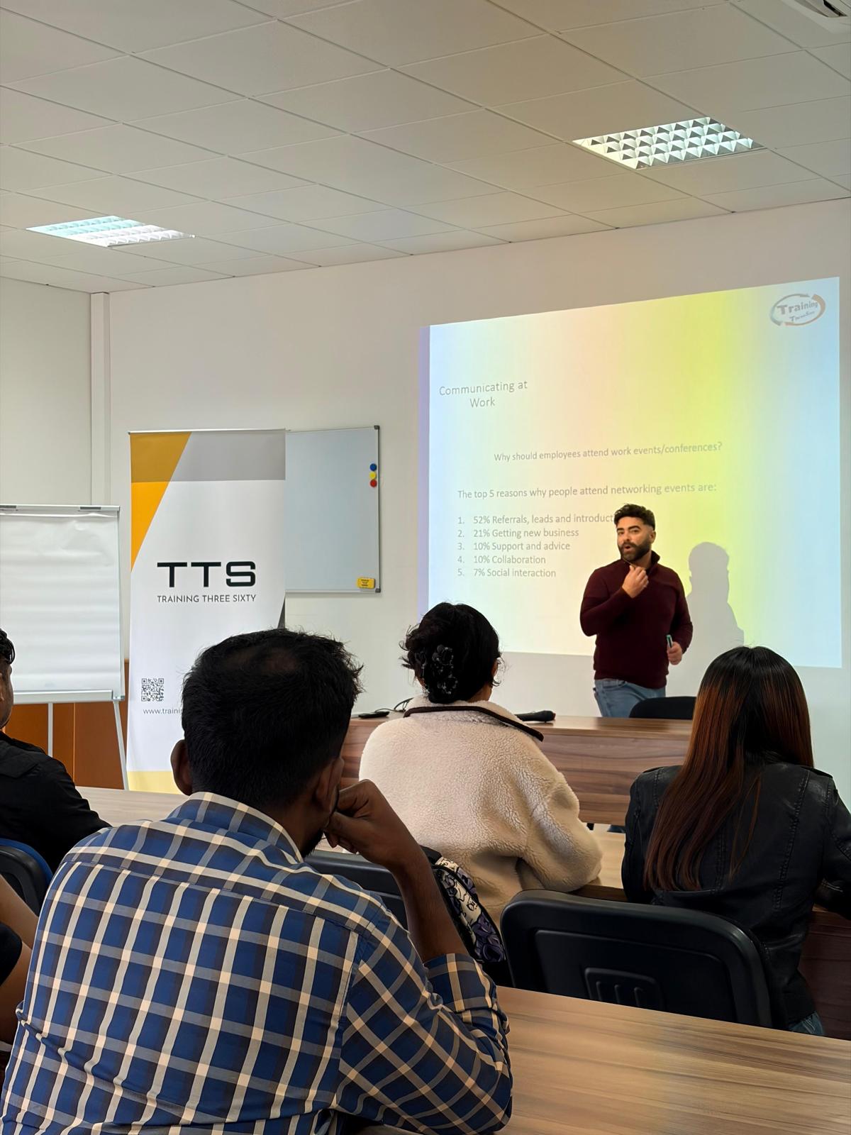 TTS instructor leading a Communicating at Work session