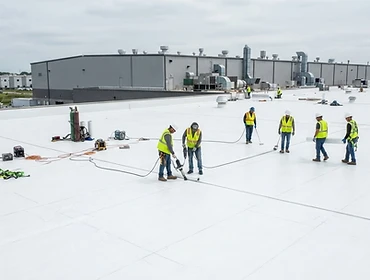 Commercial flat roof membrane installation