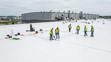 Commercial flat roof membrane installation