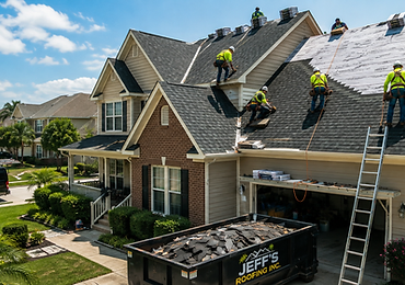 Jeff's Roofing crew of five replacing shingles on a two-story suburban home with branded dumpster and van on site
