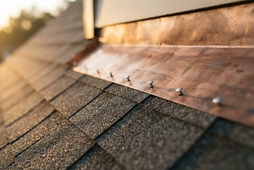 Close-up of flashing and shingle craftsmanship detail